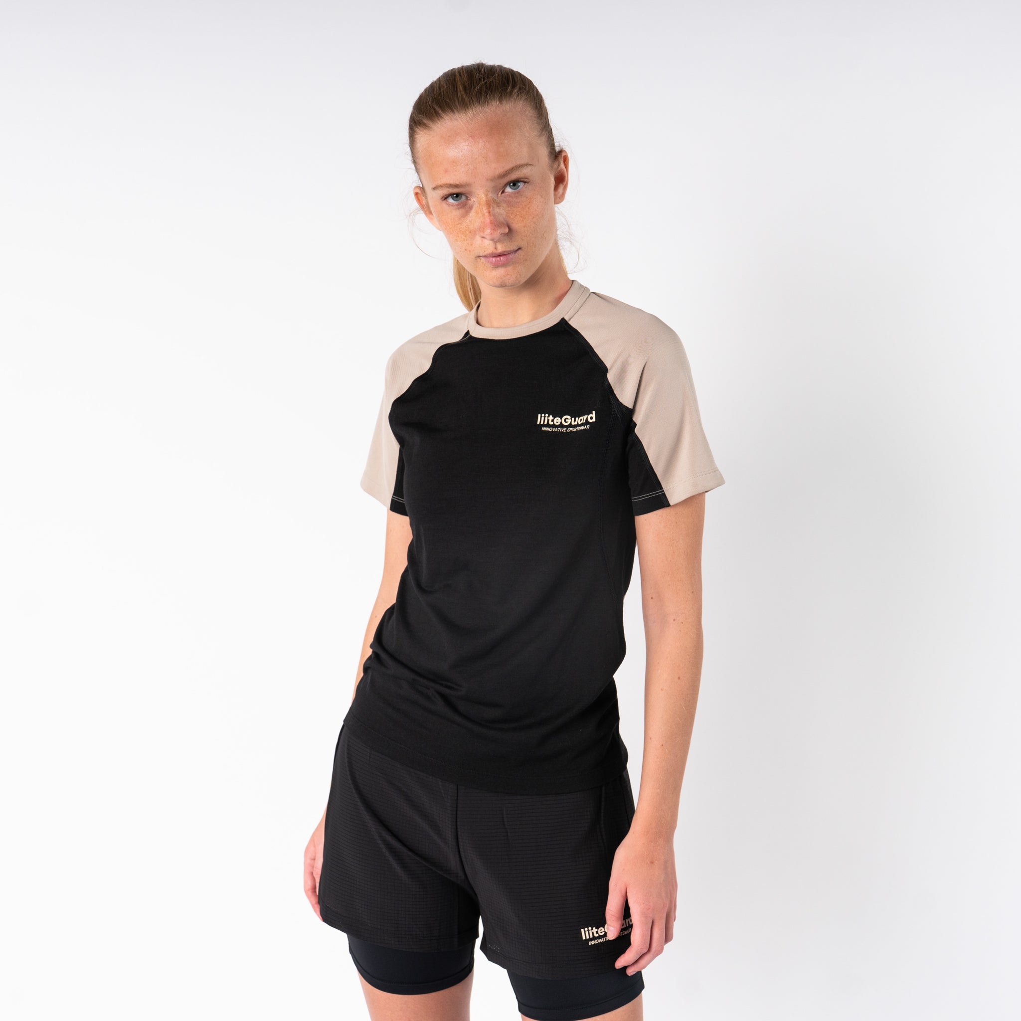 liiteGuard MERINO HYBRID T-SHIRT (WOMEN) T-shirts Black/Sand